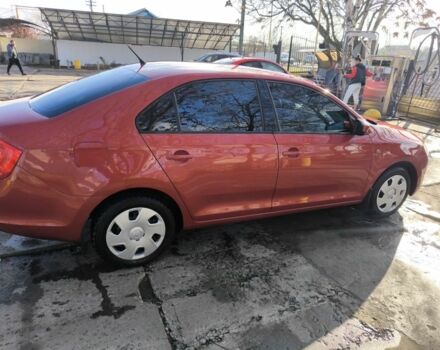 Червоний Шкода Рапід, об'ємом двигуна 1.2 л та пробігом 76 тис. км за 9000 $, фото 2 на Automoto.ua