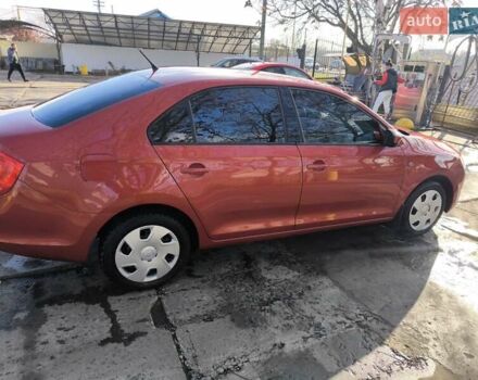 Червоний Шкода Рапід, об'ємом двигуна 1.2 л та пробігом 76 тис. км за 9000 $, фото 5 на Automoto.ua