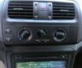 Белый Шкода Румстер, объемом двигателя 1.2 л и пробегом 253 тыс. км за 6100 $, фото 12 на Automoto.ua
