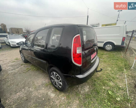 Черный Шкода Румстер, объемом двигателя 1.4 л и пробегом 222 тыс. км за 4900 $, фото 1 на Automoto.ua