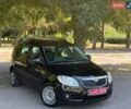 Черный Шкода Румстер, объемом двигателя 1.4 л и пробегом 224 тыс. км за 6000 $, фото 1 на Automoto.ua