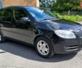 Черный Шкода Румстер, объемом двигателя 1.2 л и пробегом 157 тыс. км за 4700 $, фото 1 на Automoto.ua