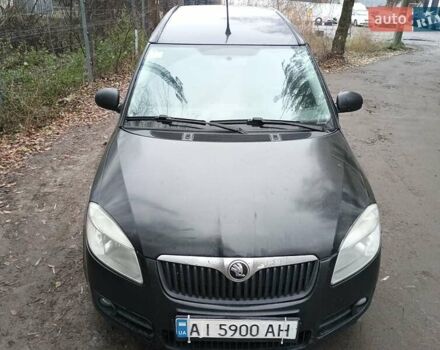 Черный Шкода Румстер, объемом двигателя 1.4 л и пробегом 300 тыс. км за 2400 $, фото 1 на Automoto.ua