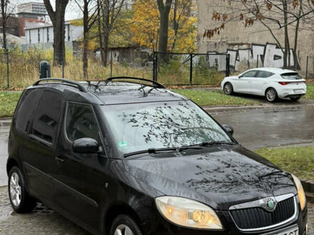 Черный Шкода Румстер, объемом двигателя 1.6 л и пробегом 193 тыс. км за 3954 $, фото 1 на Automoto.ua