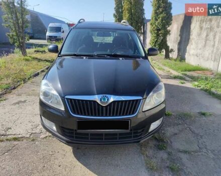 Черный Шкода Румстер, объемом двигателя 1.6 л и пробегом 355 тыс. км за 6950 $, фото 1 на Automoto.ua