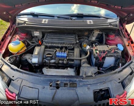 Красный Шкода Румстер, объемом двигателя 1.4 л и пробегом 200 тыс. км за 3900 $, фото 11 на Automoto.ua