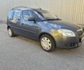 Серый Шкода Румстер, объемом двигателя 1.2 л и пробегом 206 тыс. км за 4700 $, фото 1 на Automoto.ua