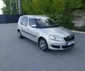 Серый Шкода Румстер, объемом двигателя 1.4 л и пробегом 275 тыс. км за 5200 $, фото 1 на Automoto.ua