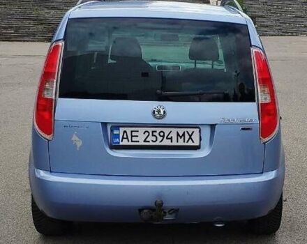 Синий Шкода Румстер, объемом двигателя 1.4 л и пробегом 330 тыс. км за 5800 $, фото 1 на Automoto.ua