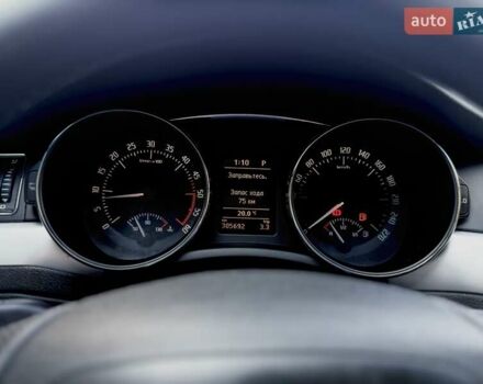 Білий Шкода Суперб, об'ємом двигуна 2 л та пробігом 305 тис. км за 9350 $, фото 52 на Automoto.ua