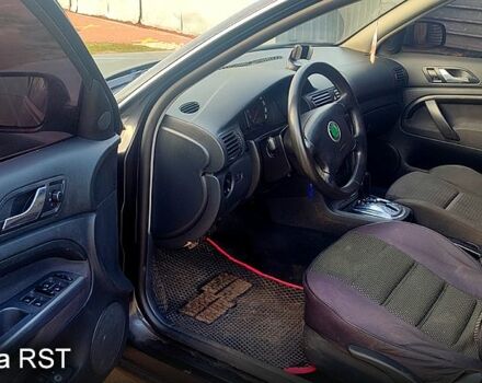 Черный Шкода Суперб, объемом двигателя 1.8 л и пробегом 334 тыс. км за 4299 $, фото 5 на Automoto.ua