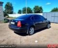 Черный Шкода Суперб, объемом двигателя 1.8 л и пробегом 230 тыс. км за 5000 $, фото 1 на Automoto.ua