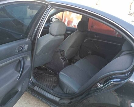 Черный Шкода Суперб, объемом двигателя 1.8 л и пробегом 240 тыс. км за 5000 $, фото 6 на Automoto.ua