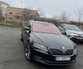 Черный Шкода Суперб, объемом двигателя 2 л и пробегом 243 тыс. км за 19900 $, фото 1 на Automoto.ua