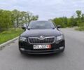 Чорний Шкода Суперб, об'ємом двигуна 2 л та пробігом 194 тис. км за 14500 $, фото 1 на Automoto.ua