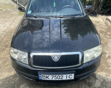 Черный Шкода Суперб, объемом двигателя 2.5 л и пробегом 293 тыс. км за 5600 $, фото 1 на Automoto.ua