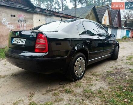 Черный Шкода Суперб, объемом двигателя 1.8 л и пробегом 347 тыс. км за 4550 $, фото 5 на Automoto.ua
