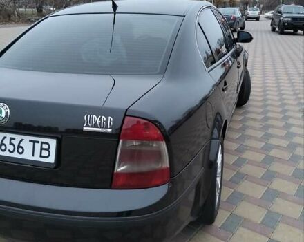 Черный Шкода Суперб, объемом двигателя 1.9 л и пробегом 240 тыс. км за 5600 $, фото 2 на Automoto.ua