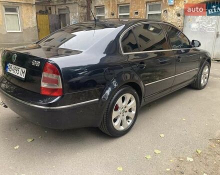 Черный Шкода Суперб, объемом двигателя 2 л и пробегом 302 тыс. км за 8000 $, фото 4 на Automoto.ua