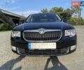 Черный Шкода Суперб, объемом двигателя 2 л и пробегом 242 тыс. км за 12200 $, фото 1 на Automoto.ua