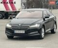 Черный Шкода Суперб, объемом двигателя 1.98 л и пробегом 112 тыс. км за 24999 $, фото 1 на Automoto.ua