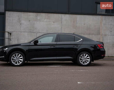 Черный Шкода Суперб, объемом двигателя 1.98 л и пробегом 27 тыс. км за 30000 $, фото 3 на Automoto.ua