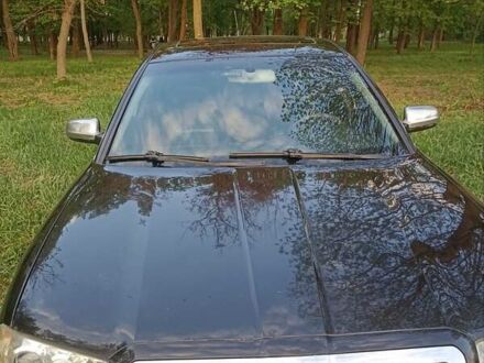 Черный Шкода Суперб, объемом двигателя 2.5 л и пробегом 300 тыс. км за 4300 $, фото 1 на Automoto.ua