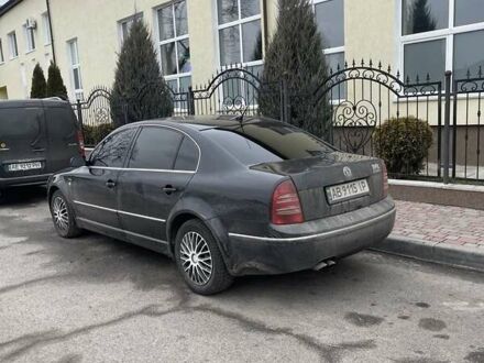 Черный Шкода Суперб, объемом двигателя 2.5 л и пробегом 248 тыс. км за 6000 $, фото 1 на Automoto.ua