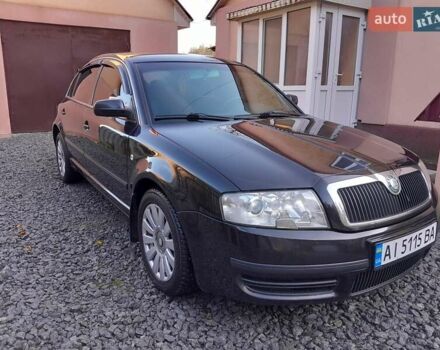 Черный Шкода Суперб, объемом двигателя 1.78 л и пробегом 250 тыс. км за 5600 $, фото 1 на Automoto.ua