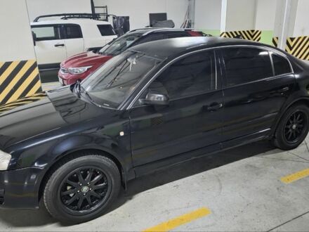 Черный Шкода Суперб, объемом двигателя 1.8 л и пробегом 257 тыс. км за 4499 $, фото 1 на Automoto.ua