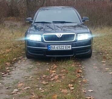 Черный Шкода Суперб, объемом двигателя 2.5 л и пробегом 403 тыс. км за 6500 $, фото 1 на Automoto.ua
