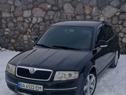 Черный Шкода Суперб, объемом двигателя 2.5 л и пробегом 403 тыс. км за 6300 $, фото 1 на Automoto.ua