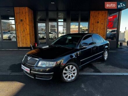 Черный Шкода Суперб, объемом двигателя 1.98 л и пробегом 210 тыс. км за 5999 $, фото 1 на Automoto.ua