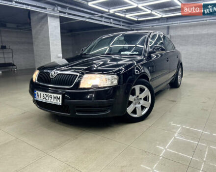 Черный Шкода Суперб, объемом двигателя 1.78 л и пробегом 302 тыс. км за 5999 $, фото 1 на Automoto.ua