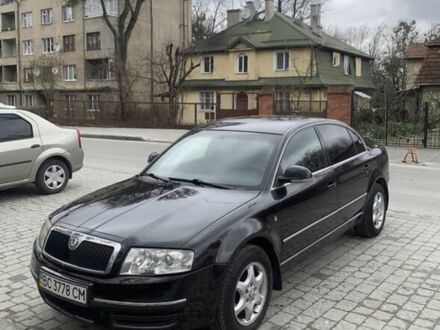 Черный Шкода Суперб, объемом двигателя 2.5 л и пробегом 265 тыс. км за 6729 $, фото 1 на Automoto.ua