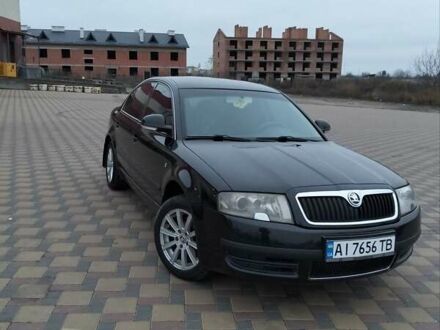 Черный Шкода Суперб, объемом двигателя 1.9 л и пробегом 240 тыс. км за 5600 $, фото 1 на Automoto.ua