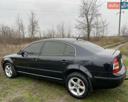 Черный Шкода Суперб, объемом двигателя 1.8 л и пробегом 260 тыс. км за 6000 $, фото 1 на Automoto.ua