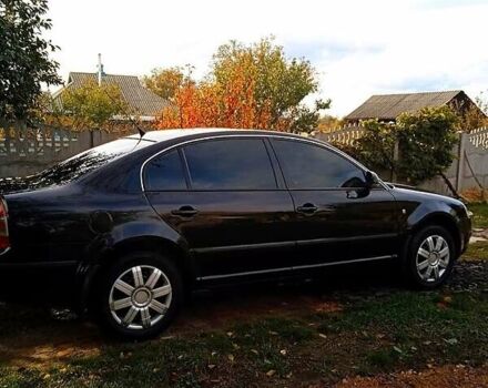 Черный Шкода Суперб, объемом двигателя 1.9 л и пробегом 307 тыс. км за 5800 $, фото 1 на Automoto.ua