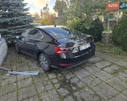 Черный Шкода Суперб, объемом двигателя 1.97 л и пробегом 138 тыс. км за 31000 $, фото 1 на Automoto.ua