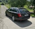 Коричневий Шкода Суперб, об'ємом двигуна 1.97 л та пробігом 243 тис. км за 11624 $, фото 1 на Automoto.ua