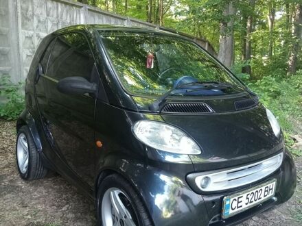 Чорний Смарт Fortwo, об'ємом двигуна 0.6 л та пробігом 294 тис. км за 2050 $, фото 1 на Automoto.ua