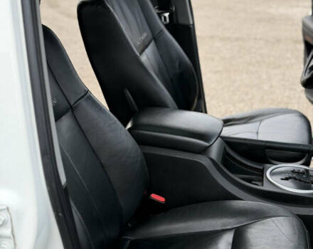 Белый Cанг Йонг Актион, объемом двигателя 2 л и пробегом 202 тыс. км за 6600 $, фото 10 на Automoto.ua