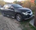 Черный Cанг Йонг Актион, объемом двигателя 2 л и пробегом 168 тыс. км за 6000 $, фото 1 на Automoto.ua