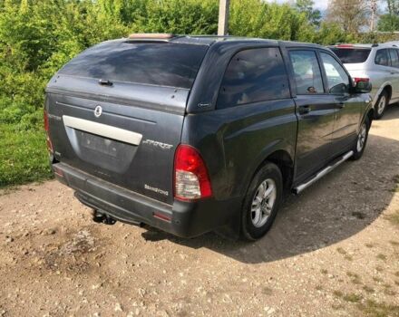 Черный Cанг Йонг Актион, объемом двигателя 2 л и пробегом 155 тыс. км за 1999 $, фото 2 на Automoto.ua