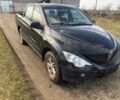 Черный Cанг Йонг Актион, объемом двигателя 2 л и пробегом 155 тыс. км за 1999 $, фото 1 на Automoto.ua