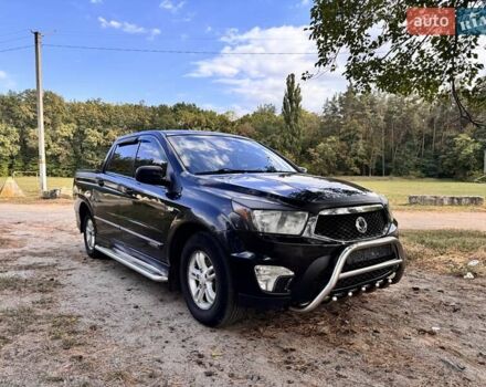 Черный Cанг Йонг Актион, объемом двигателя 2 л и пробегом 240 тыс. км за 8700 $, фото 1 на Automoto.ua