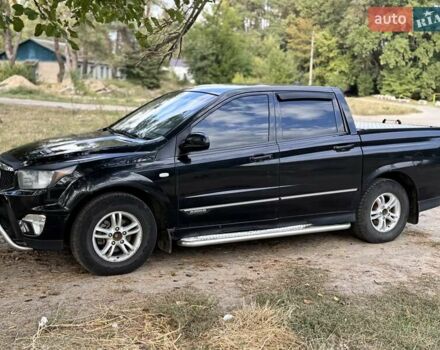 Черный Cанг Йонг Актион, объемом двигателя 2 л и пробегом 240 тыс. км за 8700 $, фото 2 на Automoto.ua