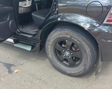 Черный Cанг Йонг Актион, объемом двигателя 2 л и пробегом 266 тыс. км за 7500 $, фото 4 на Automoto.ua