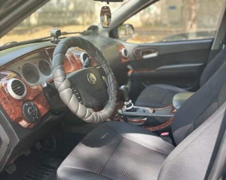 Черный Cанг Йонг Актион, объемом двигателя 2 л и пробегом 266 тыс. км за 7500 $, фото 6 на Automoto.ua