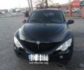 Черный Cанг Йонг Актион, объемом двигателя 2.3 л и пробегом 323 тыс. км за 4900 $, фото 1 на Automoto.ua